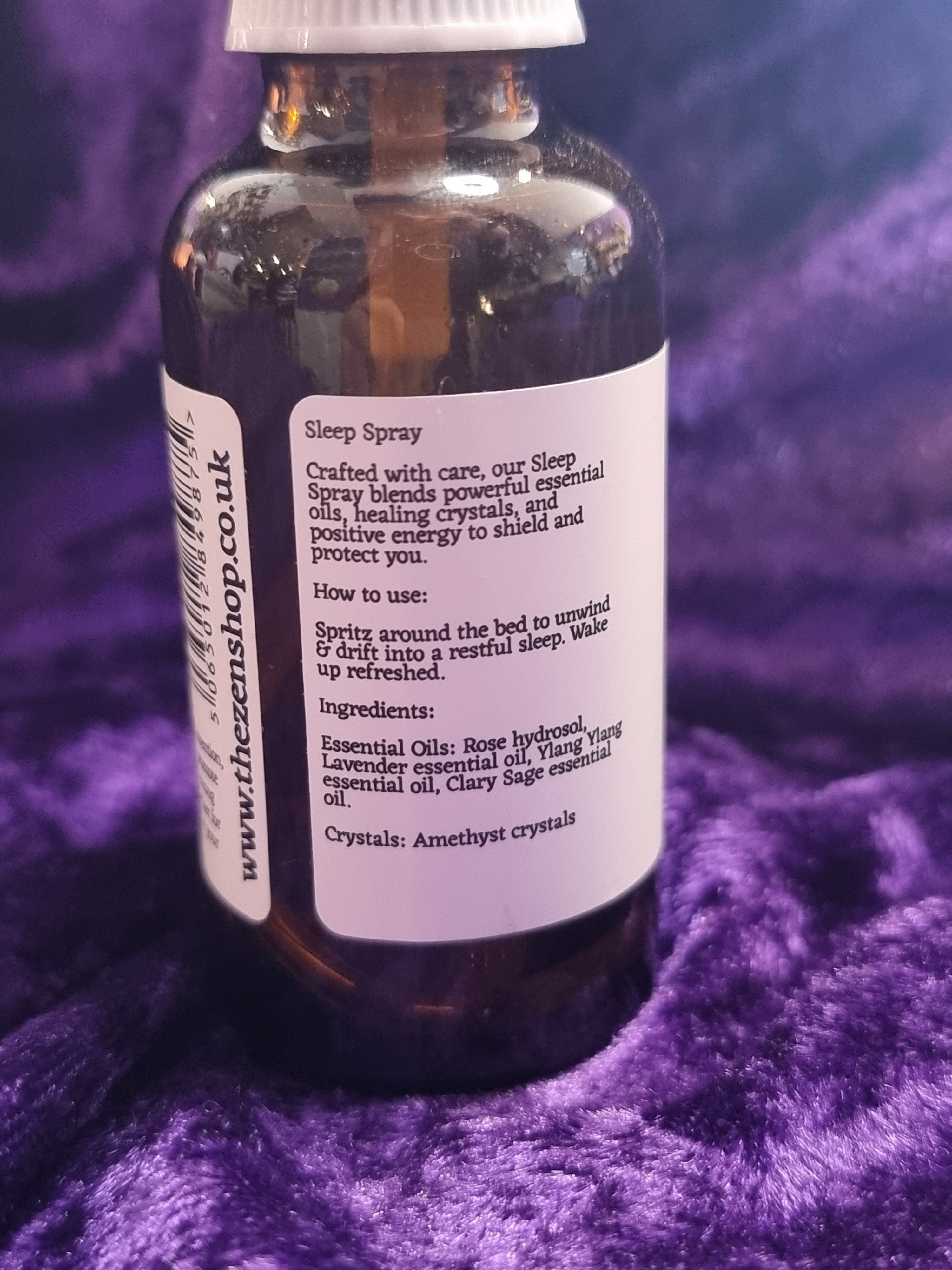 Bottle with a label on a purple textured background