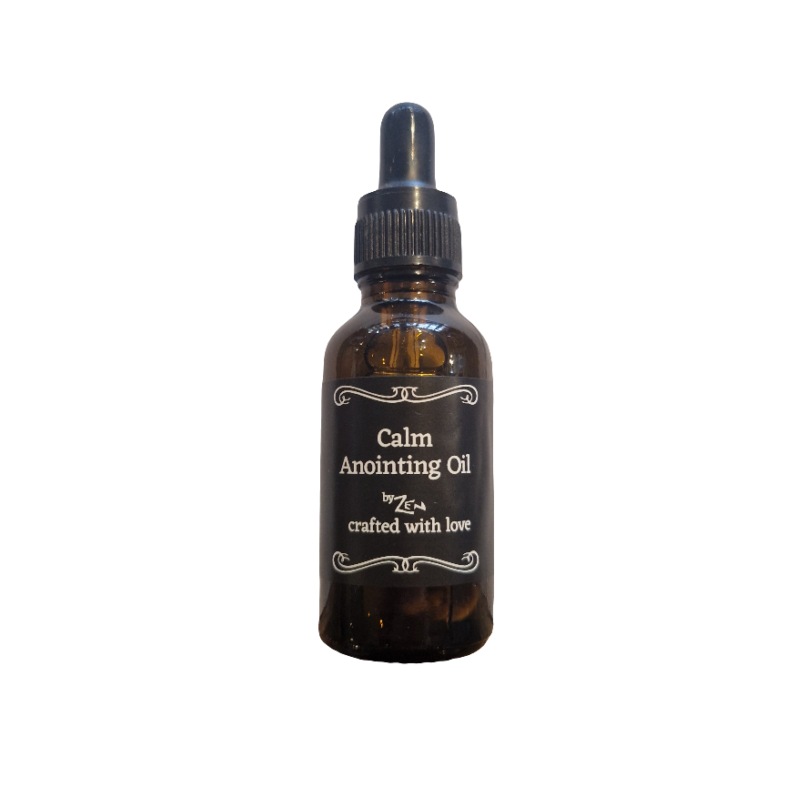 Brown glass bottle with dropper labeled 'Calm Anointing Oil' on a white background
