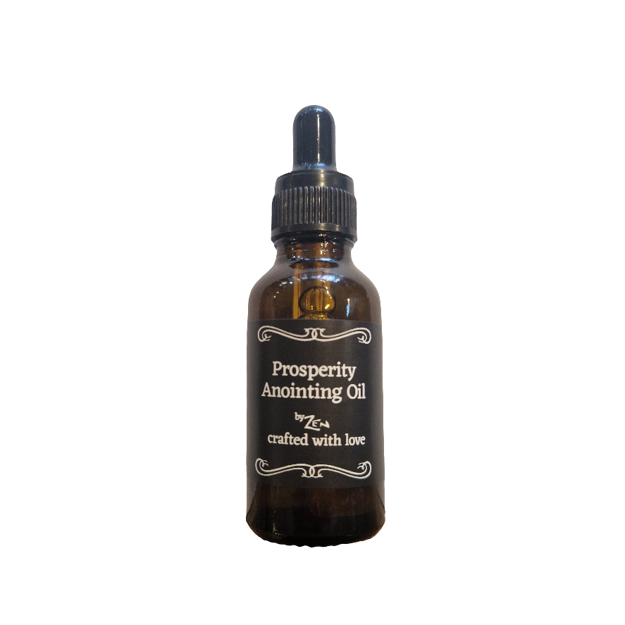 Bottle of prosperity anointing oil on a white background