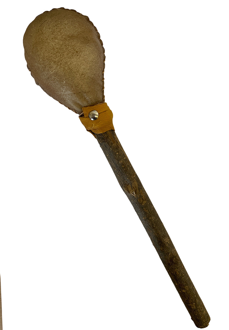 Maracas with a wooden handle and leather strap on a white background