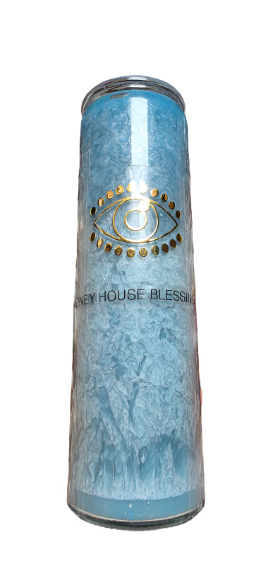 Tall cylindrical container with 'New House Blessing' text on a bed of multicolored stones